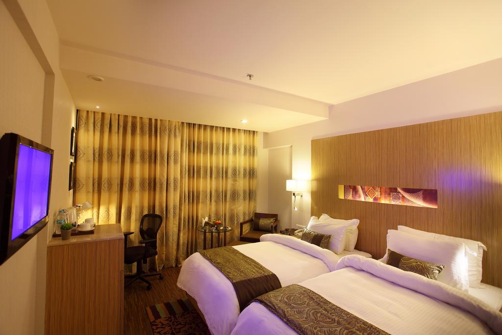 Comfort Inn Legacy Rajkot Room photo